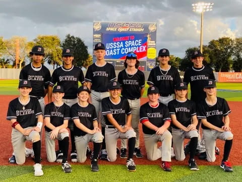 a group of baseball players posing for a photo