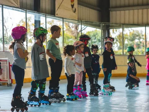 a group of kids wearing roller skates