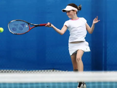 a woman playing tennis