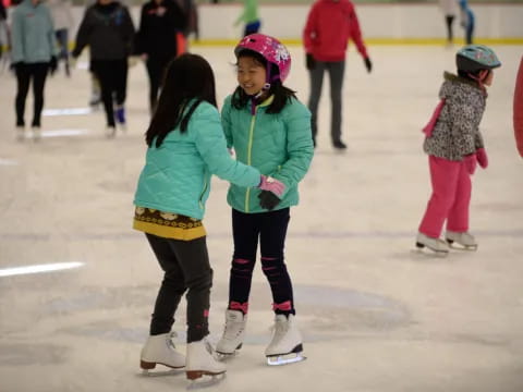 a group of people ice skating