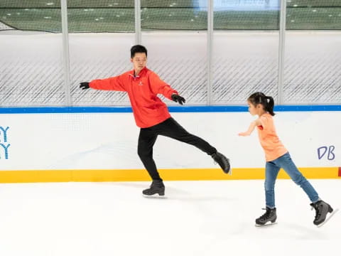 a man and a woman ice skating