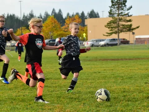 a group of girls playing football