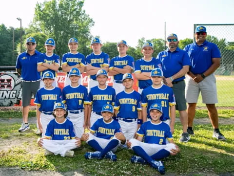 a group of people wearing blue uniforms