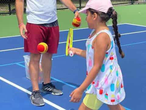 a girl playing tennis