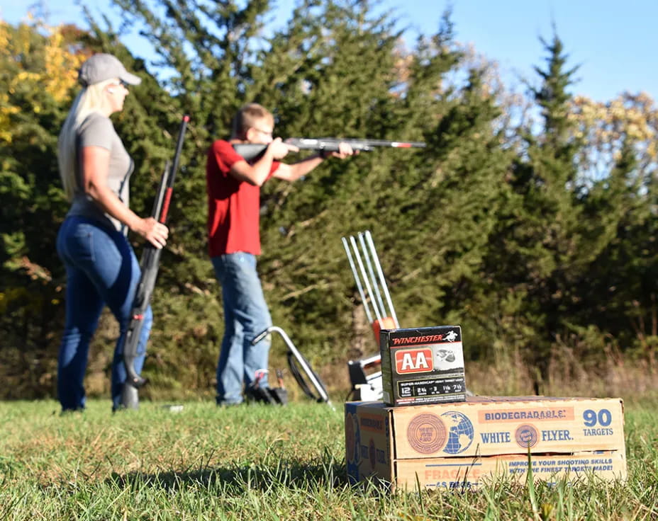 a group of people shooting bows