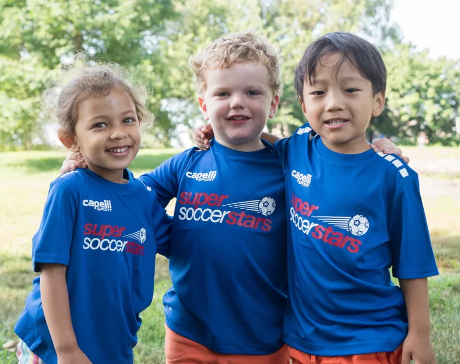 a group of boys posing for a picture