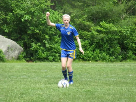 a girl playing football