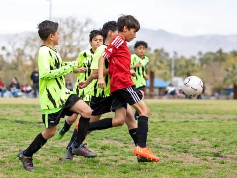 a group of boys playing football