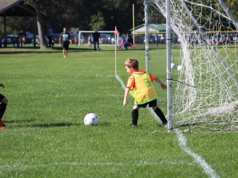 kids playing football on a field