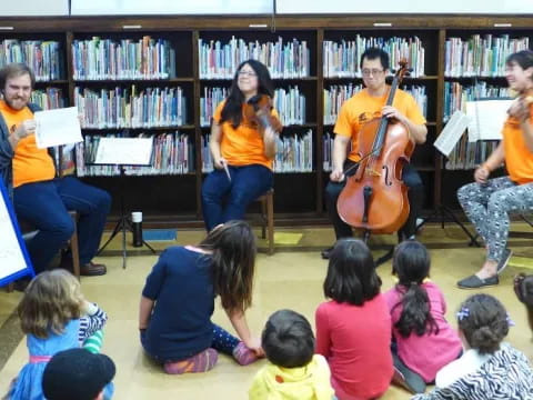 a group of children playing instruments