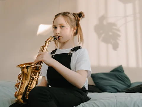 a woman playing a saxophone