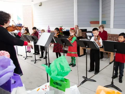 a group of kids playing instruments
