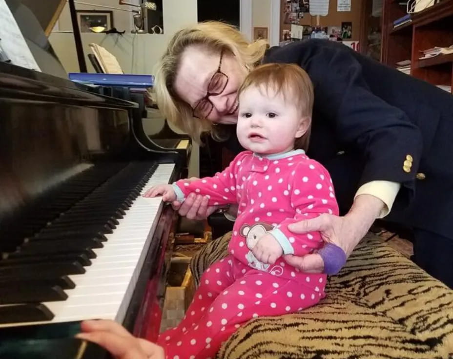 a person holding a baby