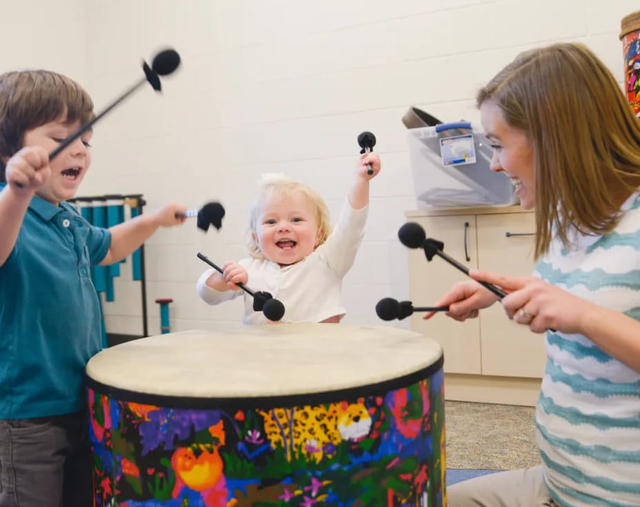 a group of kids painting