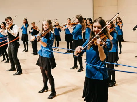 a group of people playing instruments