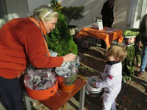 a man and a child at a table with a tree