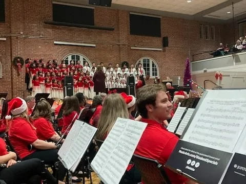 a group of people playing instruments