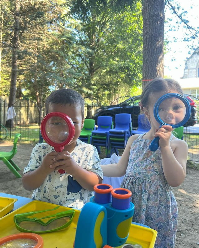 a couple of kids wearing plastic masks