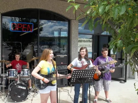 a group of people playing instruments