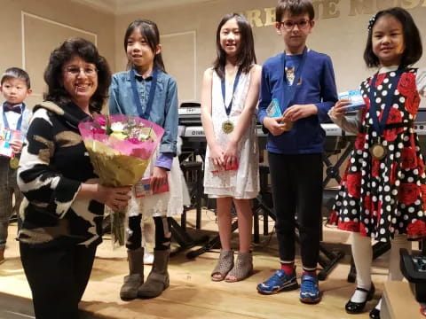 a group of people holding flowers