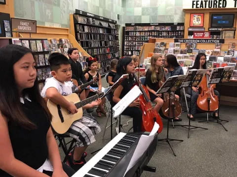 a group of people playing instruments