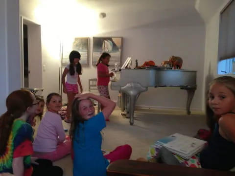 a group of girls in a room