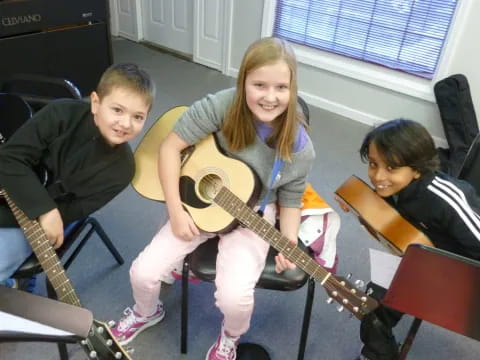 a group of kids playing instruments