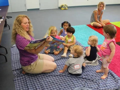 a group of children sitting on the floor