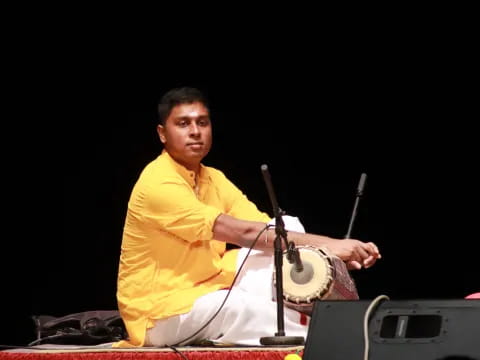 a man playing drums