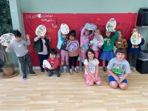 a group of children posing for a photo