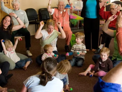 a group of people sitting on the floor