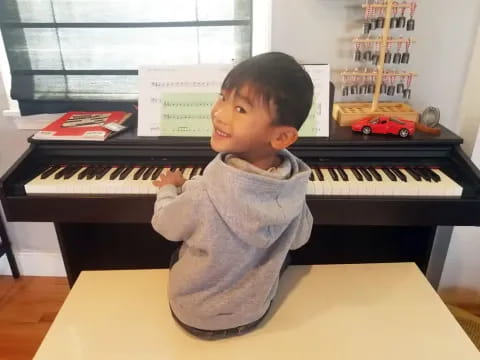 a child playing a piano