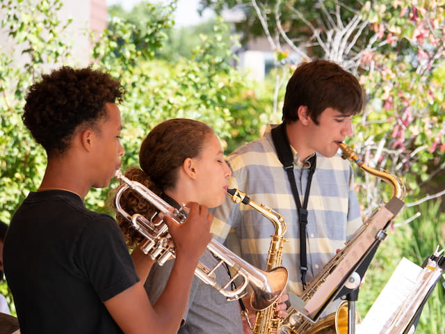 a group of people playing instruments