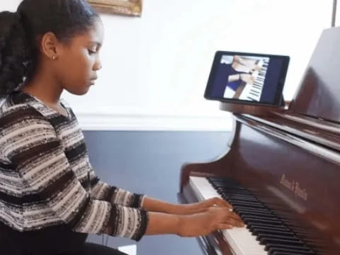 a person playing a piano