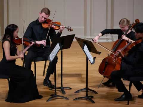 a group of people playing instruments