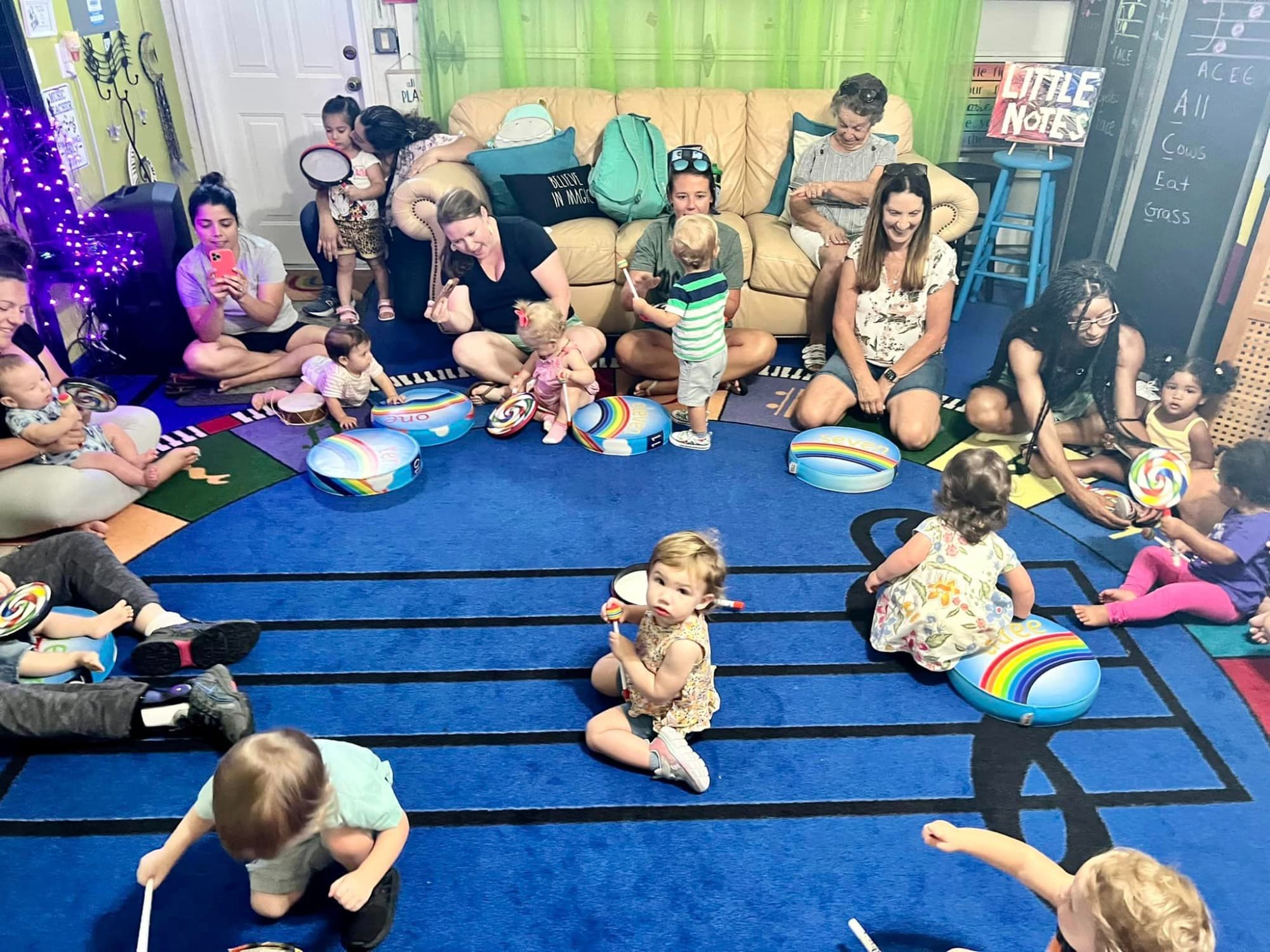 a group of people sitting on the floor