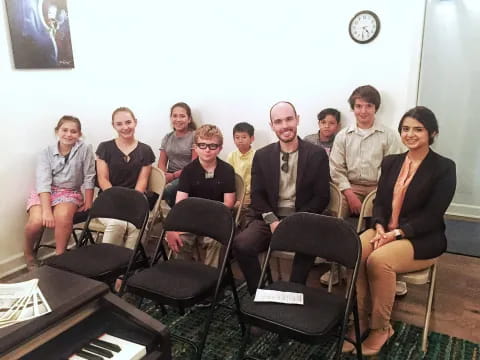 a group of people posing for a photo