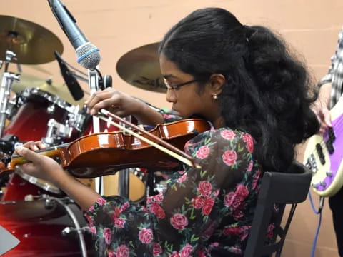 a person playing the violin