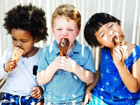 a group of kids eating ice cream