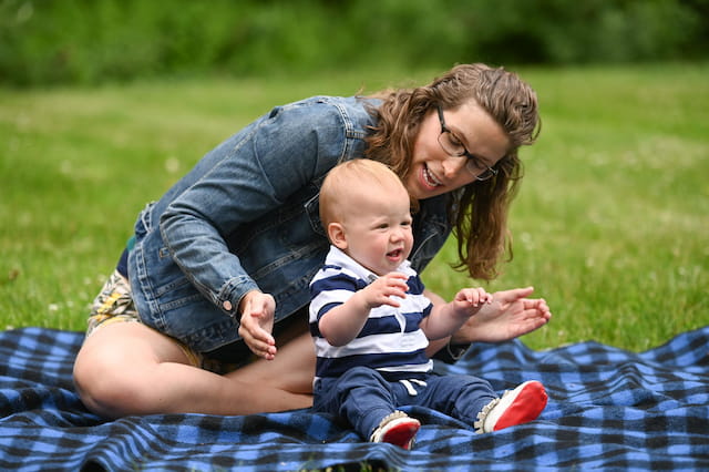 a person holding a baby