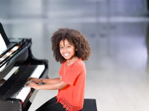 a man playing a piano