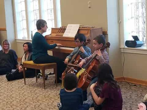 a group of people playing instruments