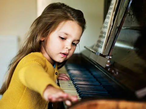 a person playing a piano