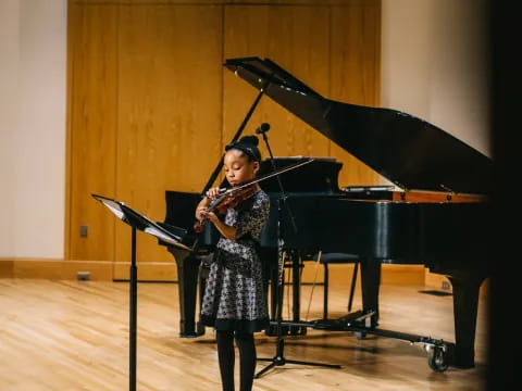 a person playing a violin