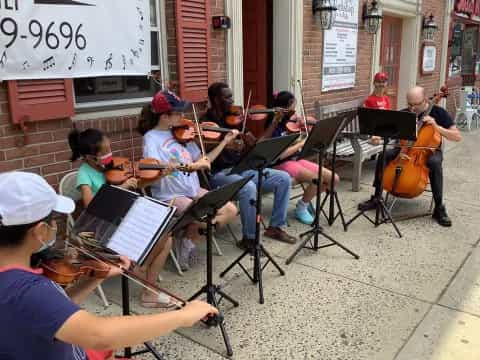 a group of people playing instruments