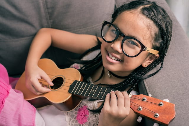 a person playing a guitar