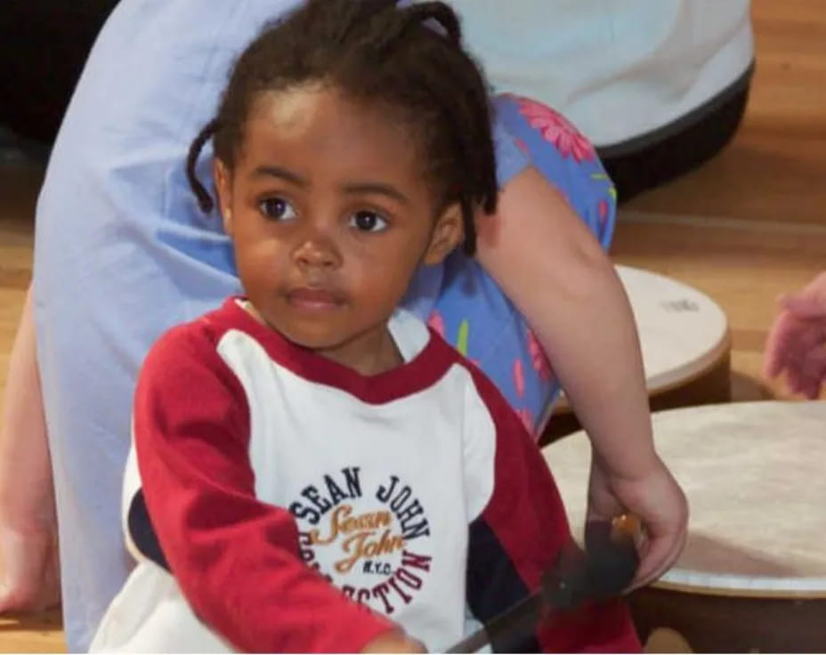 a baby in a highchair