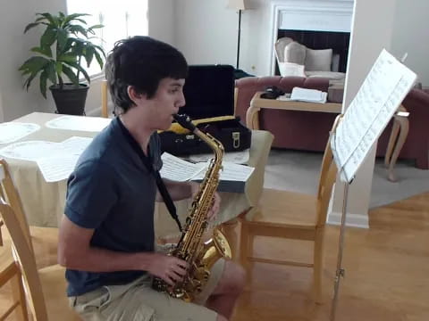 a person playing a saxophone