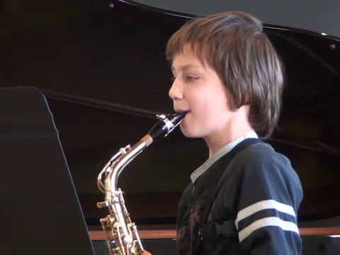 a person playing a saxophone