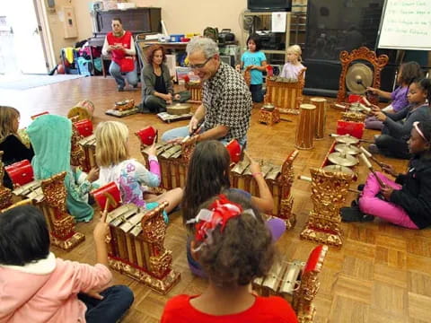 a group of people sitting in a circle